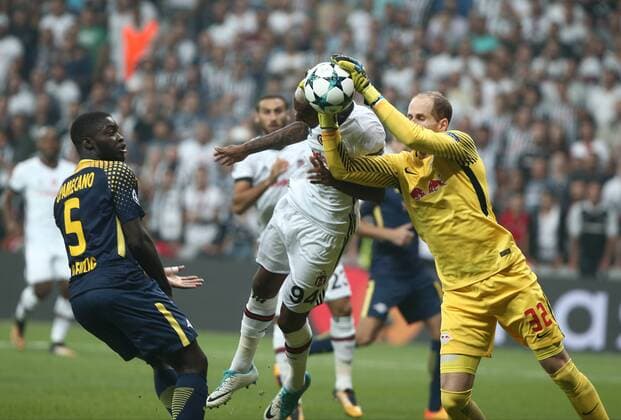 Anderson Talisca of Besiktas and Dayot Upamecano , Goalkeeper Peter Gulacsi of RB Leipzig during the UEFA Champions League Group G match between Besiktas and RB Leipzig at Vodafone Park in Istanbul , Turkey on September 26 , 2017 . 