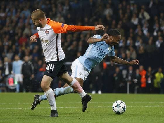 Raheem Sterling of Manchester City goes down when challenged by Yaroslav Rakytskyy of Shaktar Donetsk during the Champions League Group F match at the Emirates Stadium, Manchester. Picture date: September 26th 2017. Picture credit should read: Andrew Yates Sportimage EDITORIAL USE ONLY. No use with unauthorised audio, video, data, fixture lists, club league logos or live services. Online in-match use limited to 120 images, no video emulation. No use in betting, games or single club league player publications.