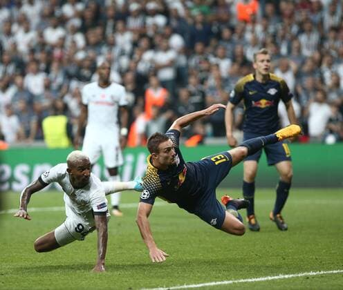 Anderson Talisca of Besiktas and Stefan Ilsanker 13 of RB Leipzig during the UEFA Champions League Group G match between Besiktas and RB Leipzig at Vodafone Park in Istanbul , Turkey on September 26 , 2017 . 