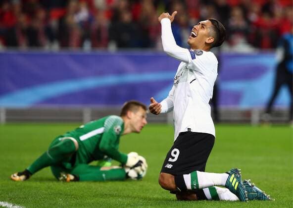 MOSCOW, RUSSIA - SEPTEMBER 26, 2017: Spartak Moscow s goalkeeper Artyom Rebrov (L) and Liverpool s Roberto Firmino in their 2017 18 UEFA Champions League Group E Round 2 football match at Otkrytie Arena Stadium. The game ended in a 1-1 draw. Stanislav Krasilnikov TASS  TS062024