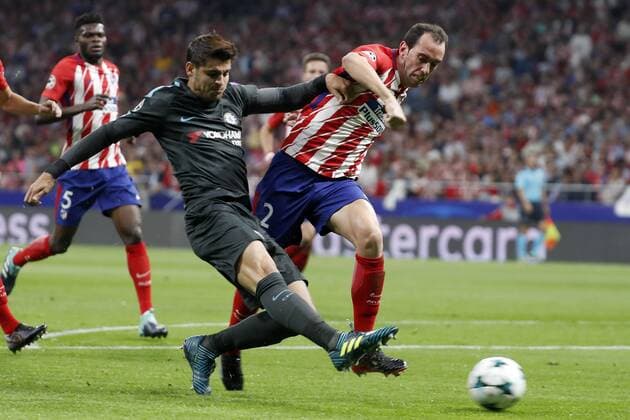 Chelsea s Spanish defender Alvaro Morata (L) and Atletico de Madrid s Uruguayan defender Diego Godin Carrasco (R) vie for the ball during the UEFA Champions League match between Atletico de Madrid and Chelsea at the Wanda Metropolitano stadium in Madrid, Spain, 27 September 2017. Atletico de Madrid vs. Chelsea !ACHTUNG: NUR REDAKTIONELLE NUTZUNG!  Copyright: xChemaxMoyax MAD010 20170927-636421438049979378