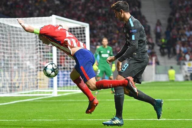 Atletico Madrid v Chelsea UEFA Champions League ??lvaro Morata of Chelsea (right) fouls Diego Godin of Atletico Madrid during the UEFA Champions League match at the Wanda Metropolitano Stadium, Madrid Content Not Available For UK Newspapers Copyright: xKristianxKanex FIL-10727-0048