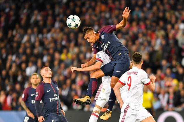 (170928) -- PARIS, Sept. 28, 2017 -- Marquinhos (C) from Paris Saint-Germain heads the ball during the match against Bayern Munich of Group B of the 2017-18 season Champions League at Parc des Princes in Paris, France on Sept. 27, 2017. Paris Saint-Germain won by 3-0 at home. ) (SP)FRANCE-PARIS-FOOTBALL-CHAMPIONS LEAGUE-PARIS SAINT-GERMAIN VS BAYERN MUNICH ChenxYichen 
