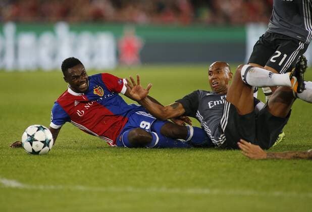 (170928) -- BASEL, Sept. 28, 2017 -- Dimitri Oberlin (L) of Basel competes with Luisao of Benfica during the UEFA Champions League group A match between Basel and Benfica in Basel, Switzerland, on Sept. 27, 2017. Basel won 5-0. ) (SP)SWITZERLAND-BASEL-FOOTBALL-CHAMPIONS LEAGUE-BASEL-BENFICA MichelexLimina 