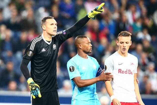 SOCCER - EL, RBS vs Marseille SALZBURG,AUSTRIA,28.SEP.17 - SOCCER - UEFA Europa League, group stage, Red Bull Salzburg vs Olympique Marseille. Image shows Yohann Pele, Patrice Evra (Marseille) and Hannes Wolf (RBS). GEPAxpictures xFelixxRoittner