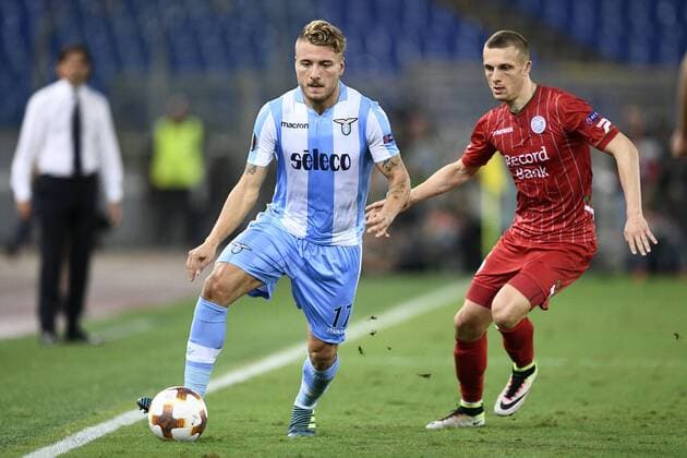Lazio s Ciro Immobile and Essevee s Timothy Derijck fight for the ball during a soccer game between Italian club Societa Sportiva Lazio and Belgian team SV Zulte Waregem, in Roma, Italy, Thursday 28 September 2017, the second game of the group stage (Group K) of the UEFA Europa League competition. YORICKxJANSENS  x05174259x