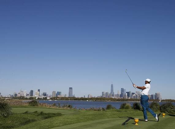 Hideki Matsuyama of the International team hits a tee shot on the 14th hole on day one of the Presidents Cup on September 28, 2017 at Liberty National Golf Club in Jersey City, New Jersey.  NYP20170928507 RICHxSCHULTZ