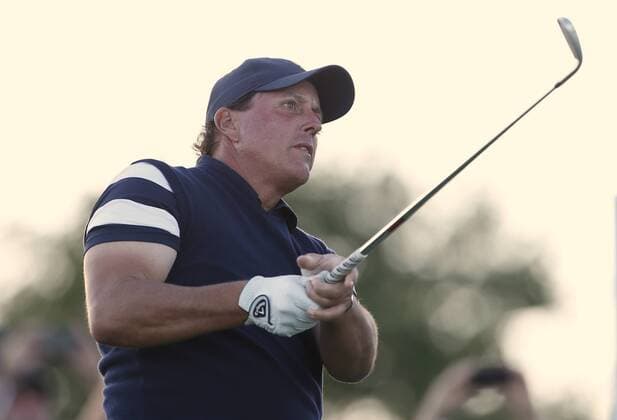 Phil Mickelson of the United States tees off on the 18th hole on day one of the Presidents Cup on September 28, 2017 at Liberty National Golf Club in Jersey City, New Jersey.  NYP20170928519 RICHxSCHULTZ