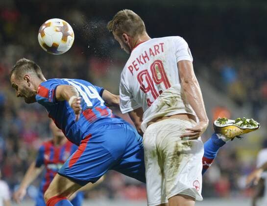 L-R RADIM REZNIK (Plzen) and TOMAS PEKHART (Beer Sheva) in action during the 2nd round group G European League soccer match Viktoria Plzen vs Hapoel Beer Sheva in Pilsen, Czech Republic, on September 28, 2017. (CTKxPhoto MiroslavxChaloupka) CTKPhotoP201709280990301  cha20