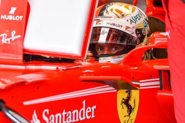 (170929) -- SEPANG, Sept. 29, 2017 -- Germany s Formula One driver Sebastian Vettel of Ferrari competes during the second practice session of the Formula One Malaysia Grand Prix at the Sepang Circuit in Malaysia, on Sept. 29, 2017. ) (SP)MALAYSIA-SEPANG-F1-2ND PRACTICE SESSION ChongxVoonxChung 