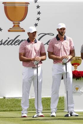 JERSEY CITY, NJ - SEPTEMBER 29: USA golfers Brooks Koepka and Dustin Johnson wait to tee off on the first hole during the second round of the Presidents Cup at Liberty National Golf Club on September 29, 2017 in Jersey City, New Jersey. (Photo by Brian Spurlock Icon Sportswire) GOLF: SEP 29 PGA Golf Herren - The Presidents Cup - Second Round Icon170929120 EDITORIAL USE ONLY