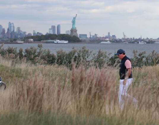 Phil Mickelson of the United States walks from the tee box on the 10th hole on day two of the Presidents Cup on September 29, 2017 at Liberty National Golf Club in Jersey City, New Jersey.  NYP20170929512 RICHxSCHULTZ