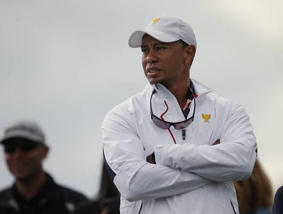 Tiger Woods, Captain s Assistant of United States watches the action on the ninth hole on day two of the Presidents Cup on September 29, 2017 at Liberty National Golf Club in Jersey City, New Jersey.  NYP20170929519 RICHxSCHULTZ