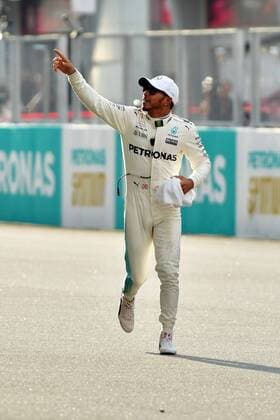 (170930) -- SEPANG, Sept. 30, 2017 -- Mercedes British driver Lewis Hamilton gestures to spectators after winning the pole position in the qualifying session at the Formula One Malaysia Grand Prix at the Sepang Circuit in Malaysia, on Sept. 30, 2017. ) (SP)MALAYSIA-SEPANG-F1-QUALIFYING SESSION ChongxVoonxChung 