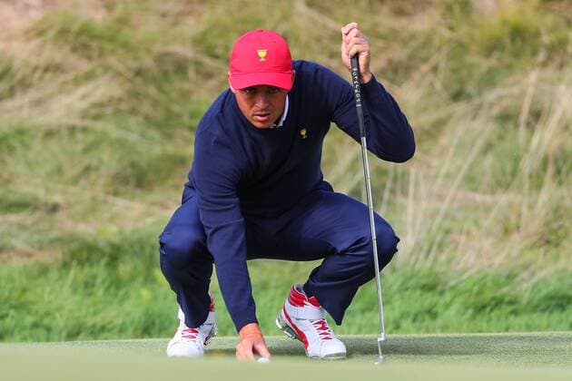 JERSEY CITY, NJ - SEPTEMBER 30: Rickie Fowler of the United States lines up a putt at the 11th hole during Saturday foursome matches of the Presidents Cup at Liberty National Golf Club on September 30, 2017 in Jersey City, New Jersey. (Photo by Rich Graessle Icon Sportswire) GOLF: SEP 30 PGA Golf Herren - The Presidents Cup - Third Round Icon09301707273 EDITORIAL USE ONLY