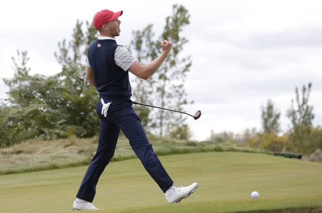 Daniel Berger from the United States reacts after making a putt for birdie on the 10th hole in the afternoon four-ball matches at the Presidents Cup on September 30, 2017 at Liberty National Golf Club in Jersey City, New Jersey. The United States leads International team 14.5 to 3.5 at the end of the days play.  NYP20170930151 JOHNxANGELILLO