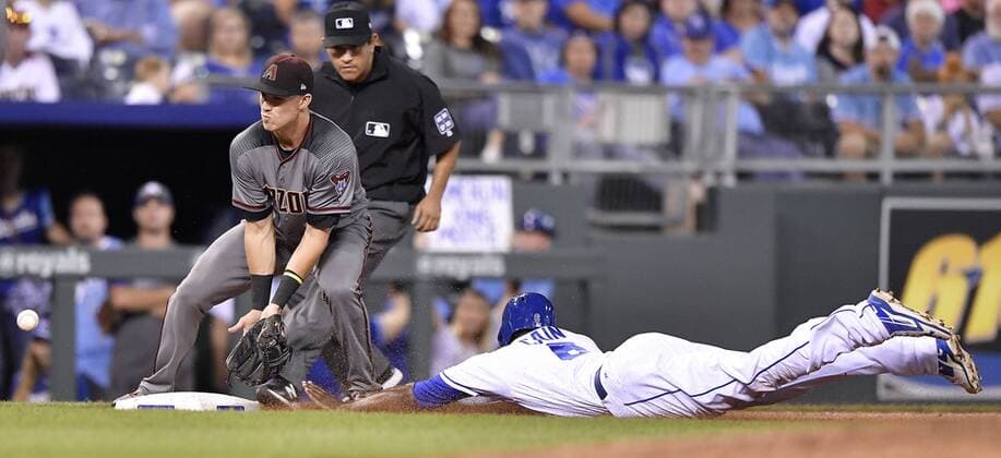 September 30, 2017 - Kansas City, MO, USA - The Kansas City Royals Lorenzo Cain steals second ahead of the throw to Arizona Diamondbacks infielder Jake Lamb in the fourth inning at Kauffman Stadium in Kansas City, Mo., on Saturday, Sept., 30, 2017. Arizona at Kansas City - ZUMAm67_ 20170930_zaf_m67_126 Copyright: xJohnxSleezerx