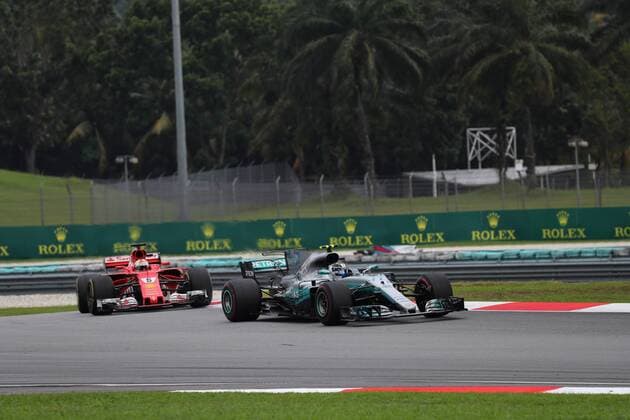 01.10.2017 - Race, Valtteri Bottas (FIN) Mercedes AMG F1 W08 leads Sebastian Vettel (GER) Scuderia Ferrari SF70H Malaysian Grand Prix, Sepang 28 September - 1 October 2017 01.10.2017 - Race, Valtteri Bottas (FIN) Mercedes AMG F1 W08 leads Sebastian Vettel (GER) Scuderia Ferrari SF70H 