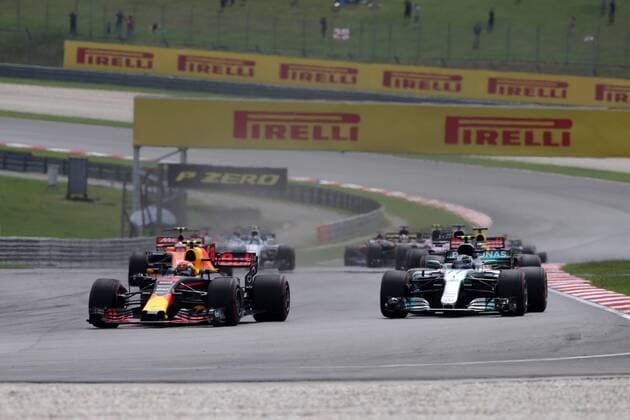 01.10.2017 - Race, Max Verstappen (NED) Red Bull Racing RB13 and Valtteri Bottas (FIN) Mercedes AMG F1 W08 Malaysian Grand Prix, Sepang 28 September - 1 October 2017 01.10.2017 - Race, Max Verstappen (NED) Red Bull Racing RB13 and Valtteri Bottas (FIN) Mercedes AMG F1 W08 