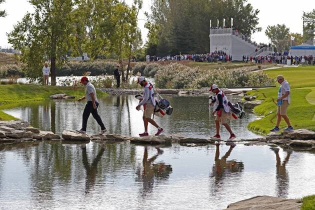 JERSEY CITY, NJ - SEPTEMBER 30: USA golfers Patrick Reed walks across a stream by stepping on rocks as he walks to the 13th tee during the third round of the Presidents Cup at Liberty National Golf Club on September 30, 2017 in Jersey City, New Jersey. (Photo by Brian Spurlock Icon Sportswire) GOLF: SEP 30 PGA Golf Herren - The Presidents Cup - Third Round Icon170930366 EDITORIAL USE ONLY