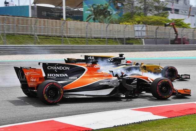 Motorsports: FIA Formula One World Championship WM Weltmeisterschaft 2017, Grand Prix of Malaysia, 14 Fernando Alonso (ESP, McLaren Honda), 27 Nico Hulkenberg (GER, Renault F1 Team), Sepang Malaysia