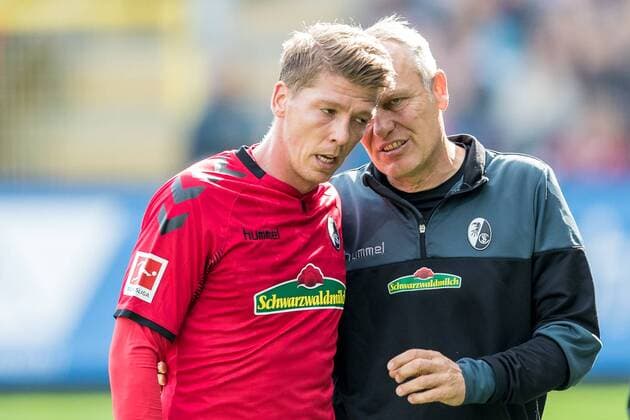 Bundesliga 7. Spieltag: SC Freiburg gegen TSG 1899 Hoffenheim Eugen Polanski (TSG 1899 Hoffenheim Nr. 8) und Christian Streich (SC Freiburg) bei Bundesliga 7. Spieltag: SC Freiburg gegen TSG 1899 Hoffenheim am 01.10. 2017 in Freiburg (Schwarzwald Stadion), Deutschland, Photo: Ulf Schiller 2017 BEAUTIFUL SPORTS xUSx