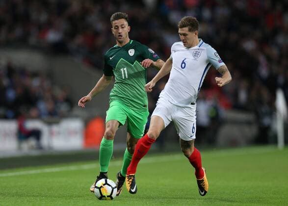 5th October 2017, Wembley Stadium, London, England; FIFA World Cup WM Weltmeisterschaft Fussball Qualification, England versus Slovenia; John Stones of England tackles Rene Krhin of Slovenia  ActionPlus11937824