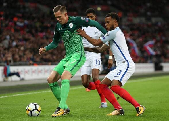 5th October 2017, Wembley Stadium, London, England; FIFA World Cup WM Weltmeisterschaft Fussball Qualification, England versus Slovenia; Ryan Bertrand of England and Marcus Rashford of England challenge Josip Ilicic of Slovenia  ActionPlus11937831