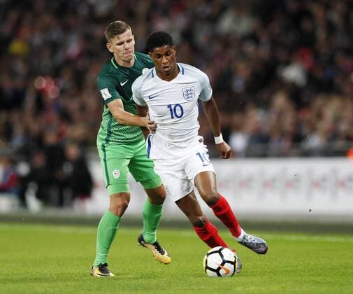 England s Marcus Rashford tussles with Slovenia s Roman Bezjak during the world cup qualifying match at Wembley Stadium, London. Picture date 5th October 2017. Picture credit should read: David Klein Sportimage EDITORIAL USE ONLY. No use with unauthorised audio, video, data, fixture lists, club league logos or live services. Online in-match use limited to 120 images, no video emulation. No use in betting, games or single club league player publications.