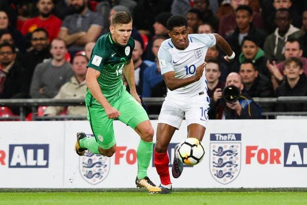 England s Marcus Rashford and SloveniaÕs Roman Bezjak during the World Cup Qualifying - European - Group F match at Wembley Stadium, London. Picture date 5th October 2017. Picture credit should read: Charlie Forgham-Bailey Sportimage EDITORIAL USE ONLY. No use with unauthorised audio, video, data, fixture lists, club league logos or live services. Online in-match use limited to 120 images, no video emulation. No use in betting, games or single club league player publications.