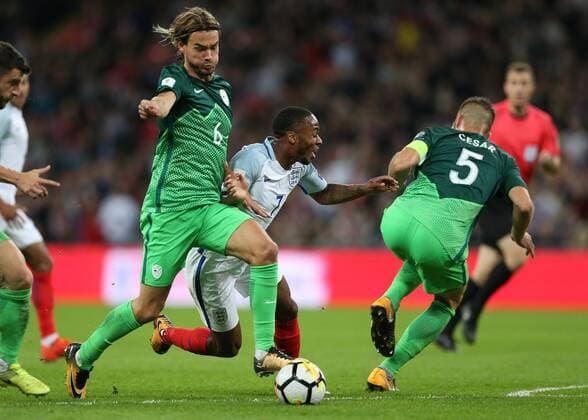 5th October 2017, Wembley Stadium, London, England; FIFA World Cup WM Weltmeisterschaft Fussball Qualification, England versus Slovenia; Raheem Sterling of England is fouled just outside the penalty area by Rene Krhin of Slovenia and Bostjan Cesar of Slovenia but Referee Felix Zwayer (GER) does not award England a free kick or penalty for the challenge  ActionPlus11937880