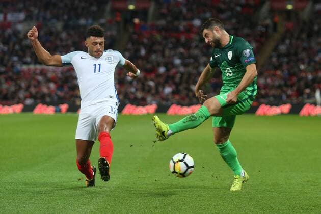 England v Slovenia 2018 FIFA World Cup WM Weltmeisterschaft Fussball Qualifying Alex Oxlade Chamberlain of England and Mitja Viler of Slovenia in action during the 2018 FIFA World Cup Qualifying match at Wembley Stadium, London, UK. Content Not Available For UK Newspapers Copyright: xPaulxChestertonx FIL-10770-0054