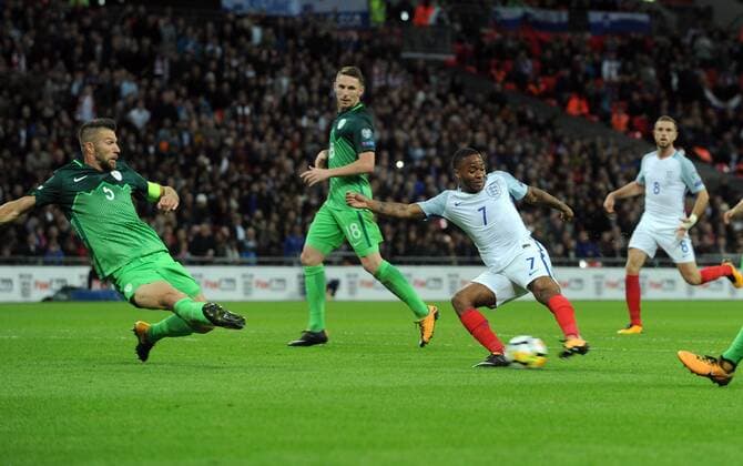 Football - 2017 2018 FIFA World Cup WM Weltmeisterschaft Fussball Qualifier - UEFA Group F: England vs. Slovenia Raheem Sterling of England fires a shot past Bostjan Cesar at Wembley. COLORSPORT ANDREW COWIE 