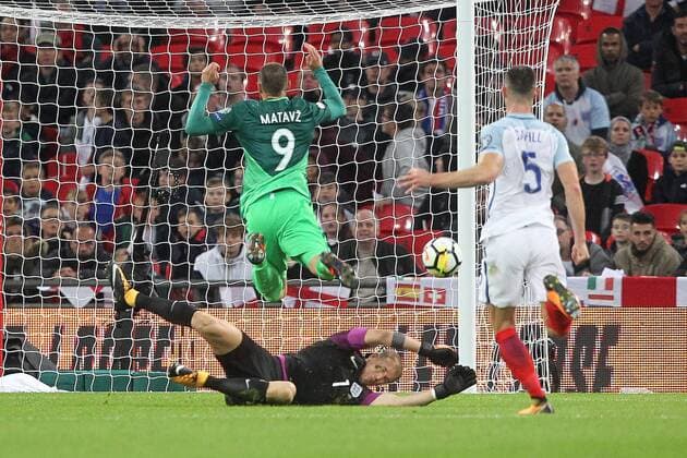 England v Slovenia 2018 FIFA World Cup WM Weltmeisterschaft Fussball Qualifying Joe Hart of England saves at the feet of Tim Matavz of Slovenia during the 2018 FIFA World Cup Qualifying match at Wembley Stadium, London, UK. Content Not Available For UK Newspapers Copyright: xPaulxChestertonx FIL-10770-0066