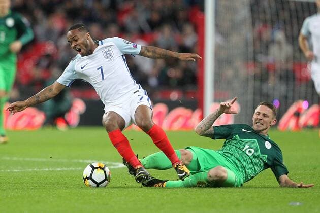 England v Slovenia 2018 FIFA World Cup WM Weltmeisterschaft Fussball Qualifying Raheem Sterling of England is fouled by Rajko Rotman of Slovenia during the 2018 FIFA World Cup Qualifying match at Wembley Stadium, London, UK. Content Not Available For UK Newspapers Copyright: xPaulxChestertonx FIL-10770-0092