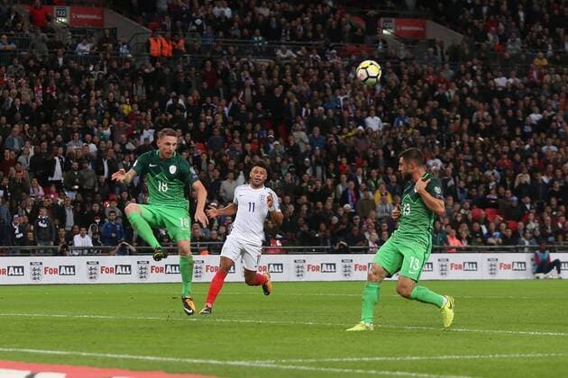 England v Slovenia 2018 FIFA World Cup WM Weltmeisterschaft Fussball Qualifying Marcus Rashford of England chips Jan Oblak of Slovenia but the ball is cleared by Rajko Rotman of Slovenia during the 2018 FIFA World Cup Qualifying match at Wembley Stadium, London, UK. Content Not Available For UK Newspapers Copyright: xPaulxChestertonx FIL-10770-0107