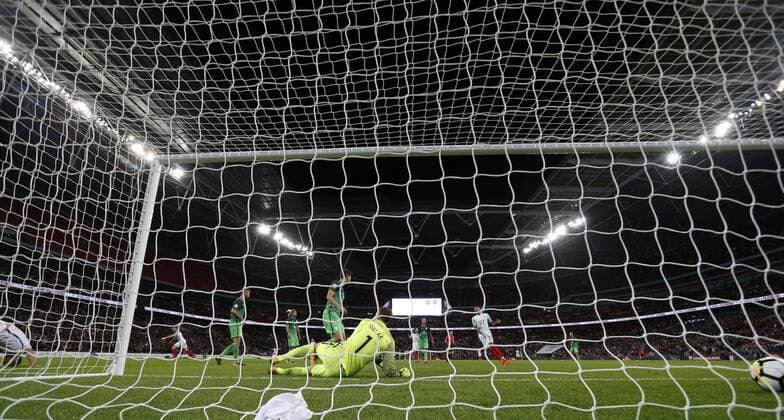 (171006) -- LONDON, Oct. 6, 2017 -- Harry Kane (R) of England scores during the FIFA World Cup WM Weltmeisterschaft Fussball 2018 European Qualifier Group E match between England and Slovenia at Wembley Stadium, in London, Britain on Oct. 5, 2017. England won 1-0. ) (SP)BRITAIN-LONDON-FOOTBALL-WORLD CUP QUALIFIER-ENGLAND VS SLOVENIA HanxYan 