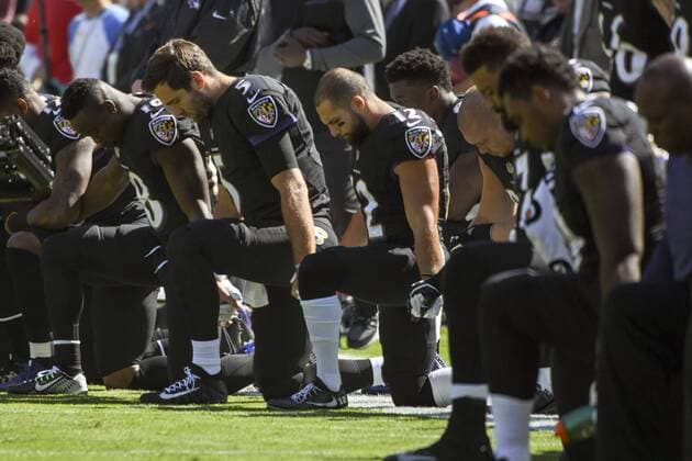 BALTIMORE, MD - OCTOBER 01: Kneeling (L-R) are Baltimore Ravens wide receiver Chris Moore (10), quarterback Joe Flacco (5), and wide receiver Michael Campanaro (12) prior to the National Anthem on October 1, 2017, at M&T Bank Stadium in Baltimore, MD. The Pittsburgh Steelers defeated the Baltimore Ravens, 26-9. (Photo by Mark Goldman Icon Sportswire) NFL American Football Herren USA OCT 01 Steelers at Ravens Icon7492017100167 EDITORIAL USE ONLY