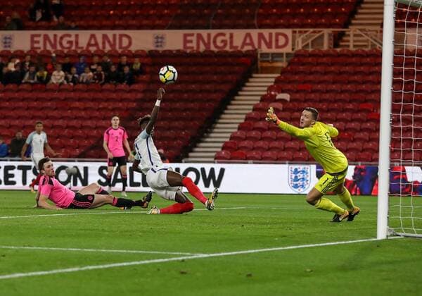Tammy Abraham of England U21 U 21 s striking the ball towards Ryan Fulton of Scotland U21Õs during the Under 21 European Championship EM Europameisterschaft Qualifier match at Riverside Stadium, Middlesbrough. Picture date 6th October 2017. Picture credit should read: Jamie Tyerman Sportimage EDITORIAL USE ONLY. No use with unauthorised audio, video, data, fixture lists, club league logos or live services. Online in-match use limited to 120 images, no video emulation. No use in betting, games or single club league player publications.