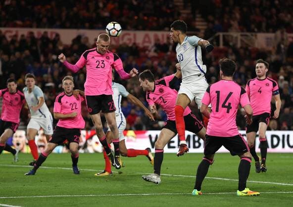 Dominic Solanke of England U21 U 21 s heading the ball towards Oliver McBurnie of Scotland U21Õs during the Under 21 European Championship EM Europameisterschaft Qualifier match at Riverside Stadium, Middlesbrough. Picture date 6th October 2017. Picture credit should read: Jamie Tyerman Sportimage EDITORIAL USE ONLY. No use with unauthorised audio, video, data, fixture lists, club league logos or live services. Online in-match use limited to 120 images, no video emulation. No use in betting, games or single club league player publications.