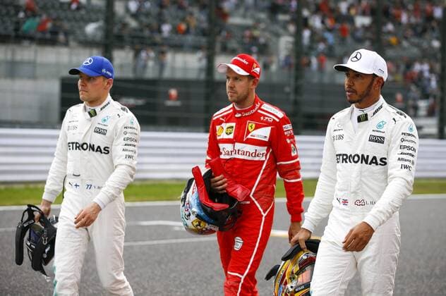 Motorsports: FIA Formula One World Championship WM Weltmeisterschaft 2017, Grand Prix of Japan, 5 Sebastian Vettel (GER, Scuderia Ferrari), 77 Valtteri Bottas (FIN, Mercedes AMG Petronas) 44 Lewis Hamilton (GBR, Mercedes AMG Petronas Formula One Team), Suzuka Japan