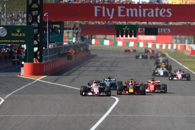 8th October 2017, Suzuka Circuit, Suzuka, Japan; Japanese Formula One Grand Prix, Sunday Race Day; Esteban Ocon - Sahara Force India overtakes Daniel Ricciardo - Red Bull Racing  ActionPlus11939012