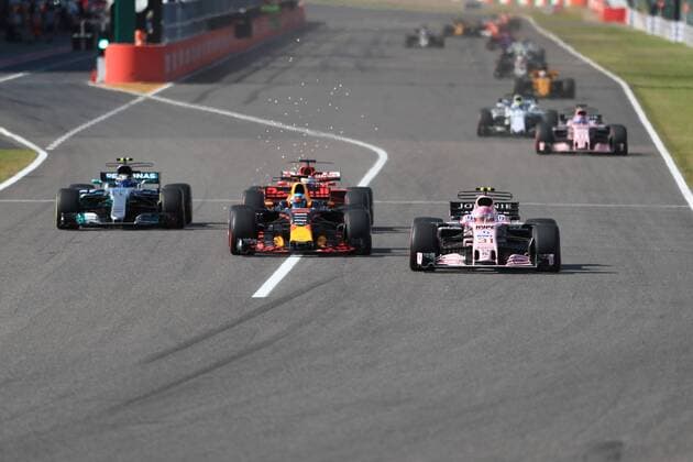 8th October 2017, Suzuka Circuit, Suzuka, Japan; Japanese Formula One Grand Prix, Sunday Race Day; Esteban Ocon - Sahara Force India passes Daniel Ricciardo and Vettel  ActionPlus11939014