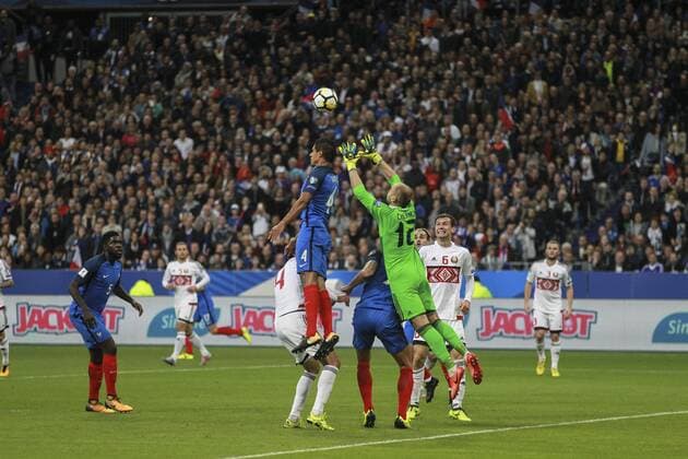 October 10, 2017 - Paris, France - Raphael Varane of France challenges goalkeeper Syarhey Chernik of Belarus during the Fifa 2018 World Cup qualifying match between France and Belarus on October 10, 2017 in Paris, France. France v Belarus - FIFA 2018 World Cup Qualifiers  - ZUMAn230 20171010_zaa_n230_470 Copyright: xElyxandroxCegarrax