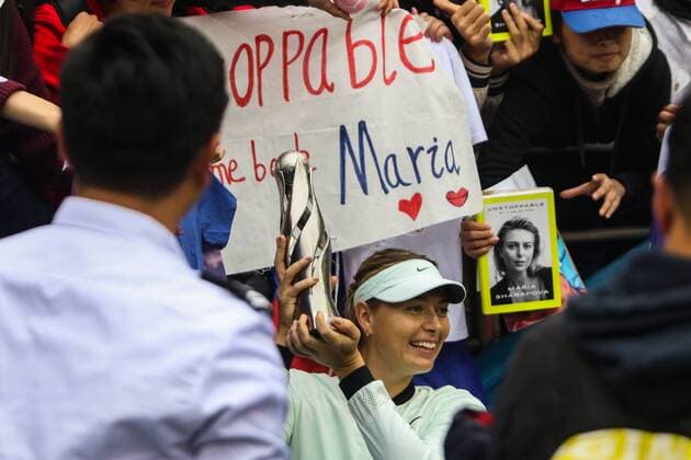 Maria Sharapova of Russia poses with her trophy at the award ceremony after defeating Aryna Sabalenka of Belarus in the women s singles final match during the 2017 WTA Tennis Damen Tianjin Open tennis tournament in Tianjin, China, 15 October 2017. Maria Sharapova defeated Irina-Camelia Begu 2-0 (6-4, 6-2). Maria Sharapova beats Aryna Sabalenka to crown 2017 WTA Tianjin Tennis Open  20171015_84268