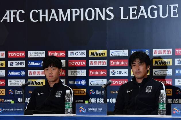 Wataru Endo, left, and head coach Takafumi Hori of Japan s Urawa Red Diamonds attend a press conference PK Pressekonferenz ahead of the second semifinal match against China s Shanghai SIPG during the 2017 AFC Champions League in Urawa, Saitama, Japan, 17 October 2017. Urawa Red Diamonds gears up for second semifinal of 2017 AFC Champions League  20171017_28742