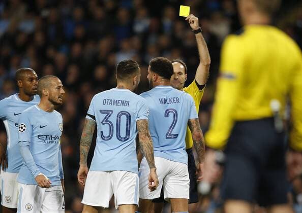 Kyle Walker of Manchester City receives a yellow card during the champions league match at the Etihad Stadium, Manchester. Picture date 17th October 2017. Picture credit should read: Simon Bellis Sportimage EDITORIAL USE ONLY. No use with unauthorised audio, video, data, fixture lists, club league logos or live services. Online in-match use limited to 120 images, no video emulation. No use in betting, games or single club league player publications.