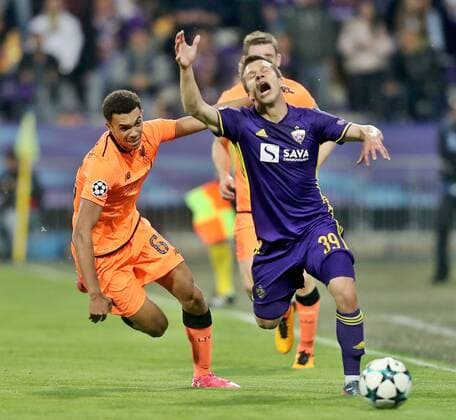 SOCCER - CL, Maribor vs Liverpool MARIBOR,SLOVENIA,17.OCT.17 - SOCCER - UEFA Champions League, group stage, NK Maribor vs Liverpool FC. Image shows Trent Alexander-Arnold (Liverpool) and Damjan Bohar (Maribor). GEPAxpictures xM.xOberlaender