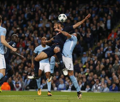 Kyle Walker of Manchester City brings down Raul Albiol of Napoli to give away a penalty during the champions league match at the Etihad Stadium, Manchester. Picture date 17th October 2017. Picture credit should read: Simon Bellis Sportimage EDITORIAL USE ONLY. No use with unauthorised audio, video, data, fixture lists, club league logos or live services. Online in-match use limited to 120 images, no video emulation. No use in betting, games or single club league player publications.