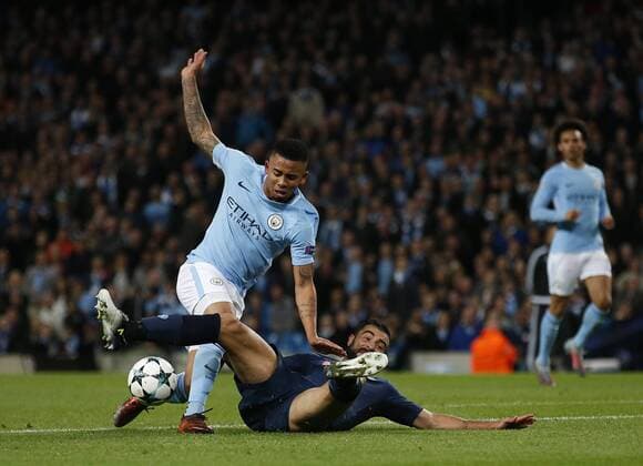 Raul Albiol of Napoli tackles Gabriel Jesus of Manchester City during the champions league match at the Etihad Stadium, Manchester. Picture date 17th October 2017. Picture credit should read: Simon Bellis Sportimage EDITORIAL USE ONLY. No use with unauthorised audio, video, data, fixture lists, club league logos or live services. Online in-match use limited to 120 images, no video emulation. No use in betting, games or single club league player publications.